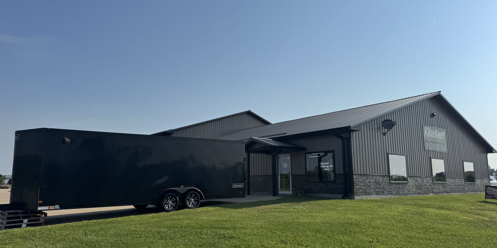 Trailer sale from Kluesner Flooring in Manchester, Iowa.